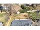 Aerial view of the home's spacious backyard, wooden fence, and storage shed at 4201 Winedale Ln, Charlotte, NC 28205