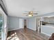 Open living room features laminate flooring, neutral walls, and is open to a kitchen at 4201 Winedale Ln, Charlotte, NC 28205