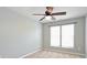 Bedroom features neutral walls, carpet, a ceiling fan and a window with blinds at 530 Pate Dr, Fort Mill, SC 29715