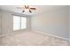 Neutral bedroom with carpet, a window with blinds, and ceiling fan at 530 Pate Dr, Fort Mill, SC 29715
