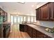 Well-lit kitchen features dark cabinetry and sleek black appliances at 530 Pate Dr, Fort Mill, SC 29715