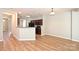 Open floor plan showcasing a kitchen with dark cabinetry and a breakfast bar at 530 Pate Dr, Fort Mill, SC 29715
