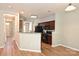 Cozy kitchen with dark wood cabinetry and modern black appliances at 530 Pate Dr, Fort Mill, SC 29715