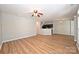 Open floor plan with expansive living area, connected kitchen, and hardwood floors at 530 Pate Dr, Fort Mill, SC 29715