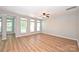 Expansive living room with ample natural light and wood-look flooring at 530 Pate Dr, Fort Mill, SC 29715