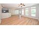 Open floor plan with expansive living area, connected kitchen, and hardwood floors at 530 Pate Dr, Fort Mill, SC 29715
