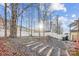 Large fenced-in backyard with mature trees and landscape at 558 Rough Hewn Ln, Rock Hill, SC 29730
