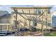 Outdoor living space featuring a patio, pergola, grill and comfortable seating area at 558 Rough Hewn Ln, Rock Hill, SC 29730