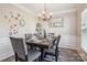 Charming dining room with elegant table setting and stylish decor at 558 Rough Hewn Ln, Rock Hill, SC 29730