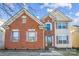 Charming brick and vinyl two-story home with colorful shutters and well-maintained landscaping at 558 Rough Hewn Ln, Rock Hill, SC 29730