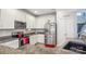 Kitchen with stainless steel appliances, granite counters, and ample cabinet space at 558 Rough Hewn Ln, Rock Hill, SC 29730