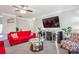 Bright living room with plush seating, and entertainment center at 558 Rough Hewn Ln, Rock Hill, SC 29730
