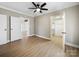 Spacious bedroom featuring ceiling fan, ensuite bath and walk-in closet at 719 Washington St, Cramerton, NC 28032