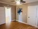 Neutral bedroom featuring luxury vinyl plank flooring with an attached closet at 719 Washington St, Cramerton, NC 28032