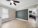 Spacious bedroom featuring luxury vinyl plank flooring and tasteful wall accents at 719 Washington St, Cramerton, NC 28032