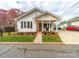 Charming single-story home featuring a welcoming front porch and well-maintained landscaping at 719 Washington St, Cramerton, NC 28032