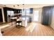 Updated kitchen boasts stainless steel appliances, granite counters, and central island at 719 Washington St, Cramerton, NC 28032