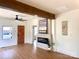 Bright, updated living room featuring a modern fireplace and exposed beam at 719 Washington St, Cramerton, NC 28032