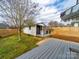 View of the backyard shed with access to the new backyard fence at 719 Washington St, Cramerton, NC 28032