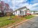 Cozy home with a fenced yard, showcasing its neat exterior and neighborhood charm at 719 Washington St, Cramerton, NC 28032