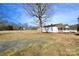 Property with a vast yard and a quaint home at 7311 Dogwood Ln, Kannapolis, NC 28081