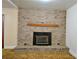 Close up on brick fireplace in living room at 7311 Dogwood Ln, Kannapolis, NC 28081