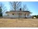 Cozy home with a covered front porch, perfect for enjoying the outdoors at 7311 Dogwood Ln, Kannapolis, NC 28081