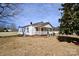 Charming single-story home with a inviting front porch and white siding at 7311 Dogwood Ln, Kannapolis, NC 28081