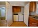 Laundry area with updated washer and dryer at 7311 Dogwood Ln, Kannapolis, NC 28081