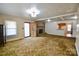 Cozy living room featuring a brick fireplace at 7311 Dogwood Ln, Kannapolis, NC 28081