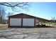 Newer steel outbuilding with 2 bays and covered storage at 7311 Dogwood Ln, Kannapolis, NC 28081