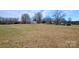 Wide shot of land with different outbuildings at 7311 Dogwood Ln, Kannapolis, NC 28081