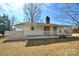 Exterior showcasing the rear porch, perfect for outdoor relaxation and entertainment at 7311 Dogwood Ln, Kannapolis, NC 28081