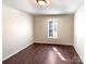 Bedroom with wood flooring and window with shutters at 807 Limerick Dr, Dallas, NC 28034