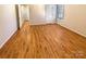 Bedroom with wood-look flooring and neutral walls at 807 Limerick Dr, Dallas, NC 28034