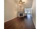 Spacious living room with hardwood floors, a fireplace, and lots of natural light at 807 Limerick Dr, Dallas, NC 28034