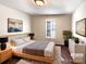 Serene main bedroom with stylish decor and plenty of natural light at 807 Limerick Dr, Dallas, NC 28034
