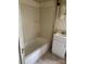 Bathroom featuring a white vanity, bathtub, and aged tiling, perfect for a remodel at 1010 13Th St # 11, Lancaster, SC 29720