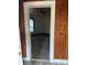 An interior view of the living room and ceiling fan through the doorway at 1010 13Th St # 11, Lancaster, SC 29720