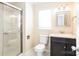 Bathroom with a shower and a dark vanity cabinet at 1052 Palmyra Dr, Fort Mill, SC 29708