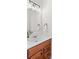 Powder room with decorative mirror, wall-mounted towel rings, and potted plant at 109 Gannett Dr, Mooresville, NC 28117