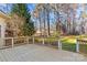 New deck with a view of the expansive backyard and mature trees, perfect for outdoor entertaining at 109 Gannett Dr, Mooresville, NC 28117