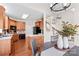 Large open kitchen with wood cabinets, stainless steel appliances, and an adjoining dining area at 109 Gannett Dr, Mooresville, NC 28117