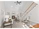 Bright living room with fireplace and a staircase, offering a relaxing space at 109 Gannett Dr, Mooresville, NC 28117