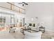 Spacious living room with high ceilings and lots of natural light, featuring neutral decor at 109 Gannett Dr, Mooresville, NC 28117