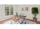 Office space featuring a rustic wooden desk, a large window and natural light at 109 Gannett Dr, Mooresville, NC 28117