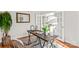 Bright office space with natural light featuring a wooden desk and neutral decor at 109 Gannett Dr, Mooresville, NC 28117