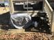 An outdoor deck has a gray Blackstone grill covered, with outdoor seating visible on the deck at 109 Pembrooke Trl # F171, Mount Gilead, NC 27306