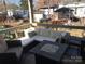 Relaxing porch with comfortable seating and a fire pit, perfect for outdoor entertaining and enjoying peaceful moments at 109 Pembrooke Trl # F171, Mount Gilead, NC 27306