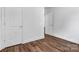 Bedroom view showcasing wood-look flooring, fresh paint, and neutral doors and trim at 1125 Mcdow Dr, Rock Hill, SC 29732